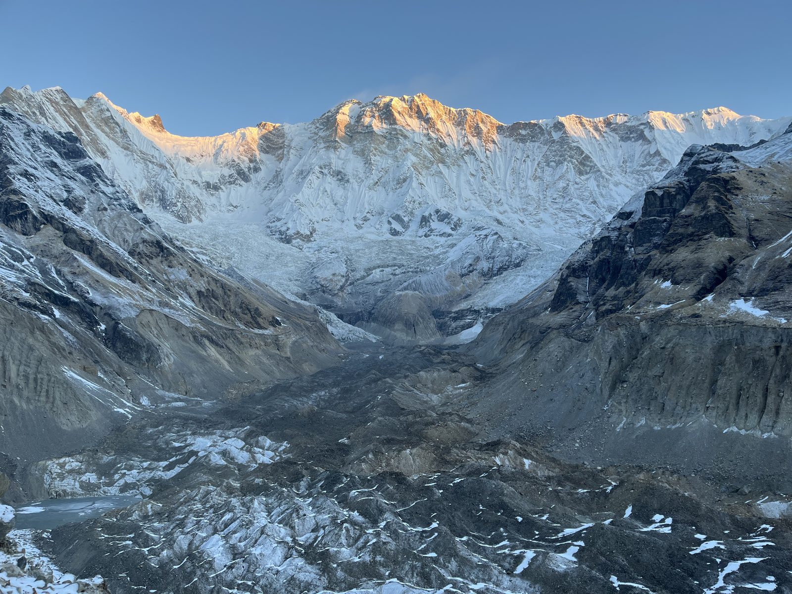 Alpenglow on the snow walls of the Annapurna Sanctuary amphitheatre
