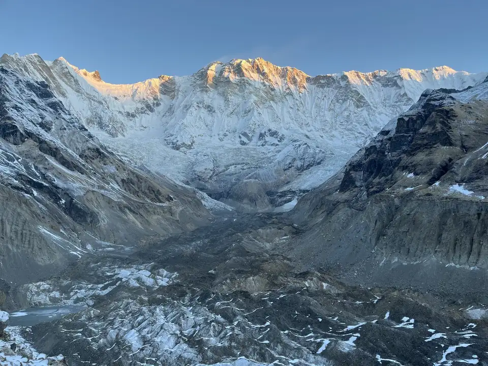 Alpenglow on the snow walls of the Annapurna Sanctuary amphitheatre