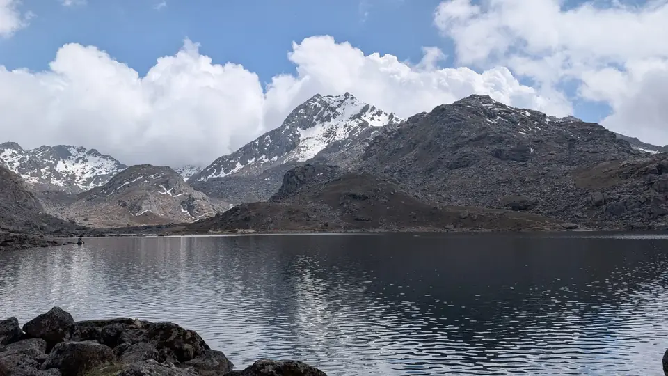 The Gosaikunda lake mirroring snow peaks